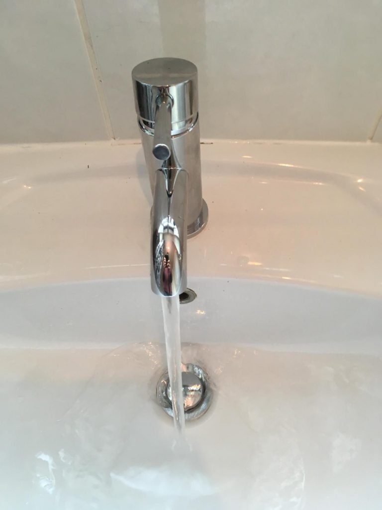 image of a running tap